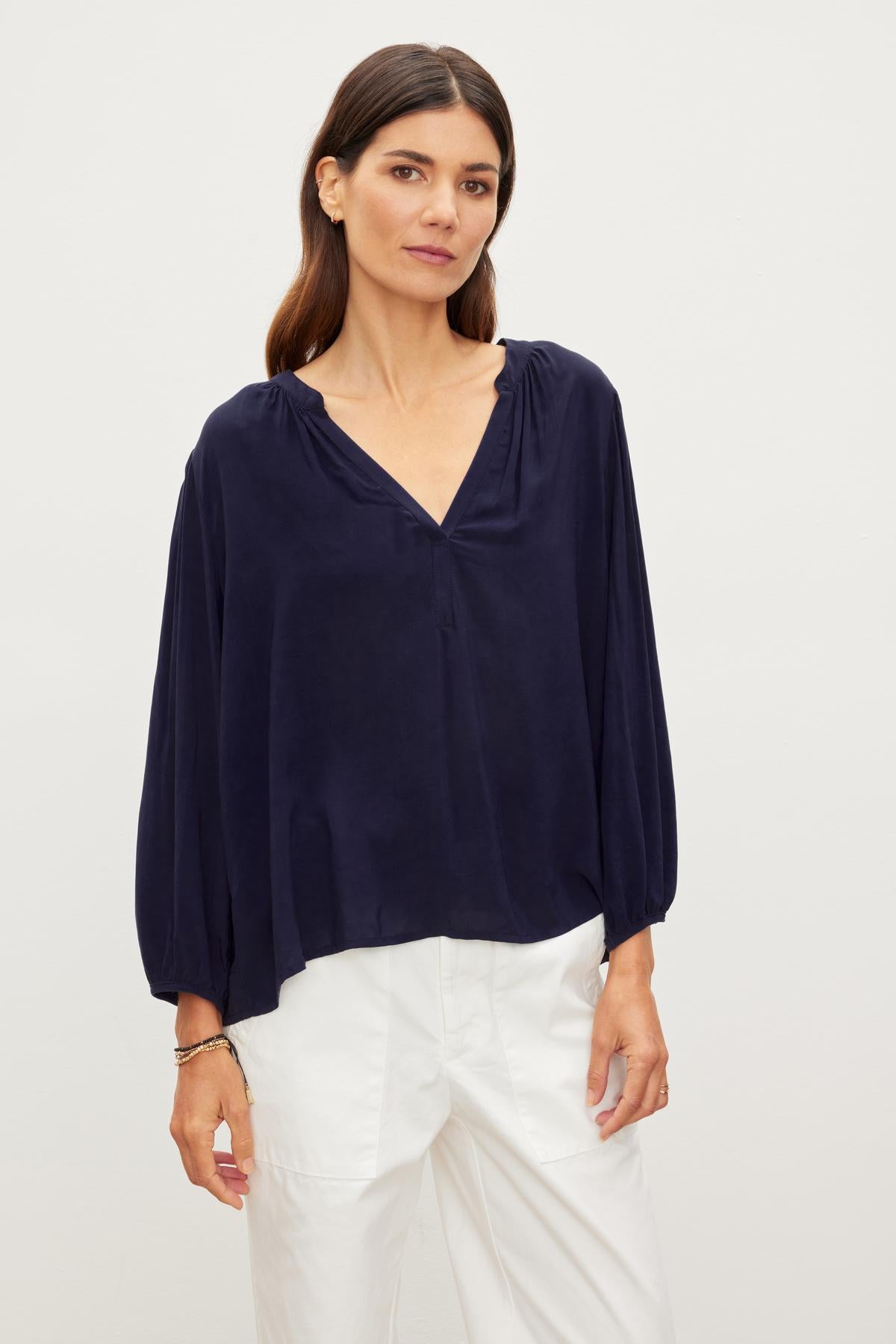 ASHLEY V-NECK TOP IN POSTMAN