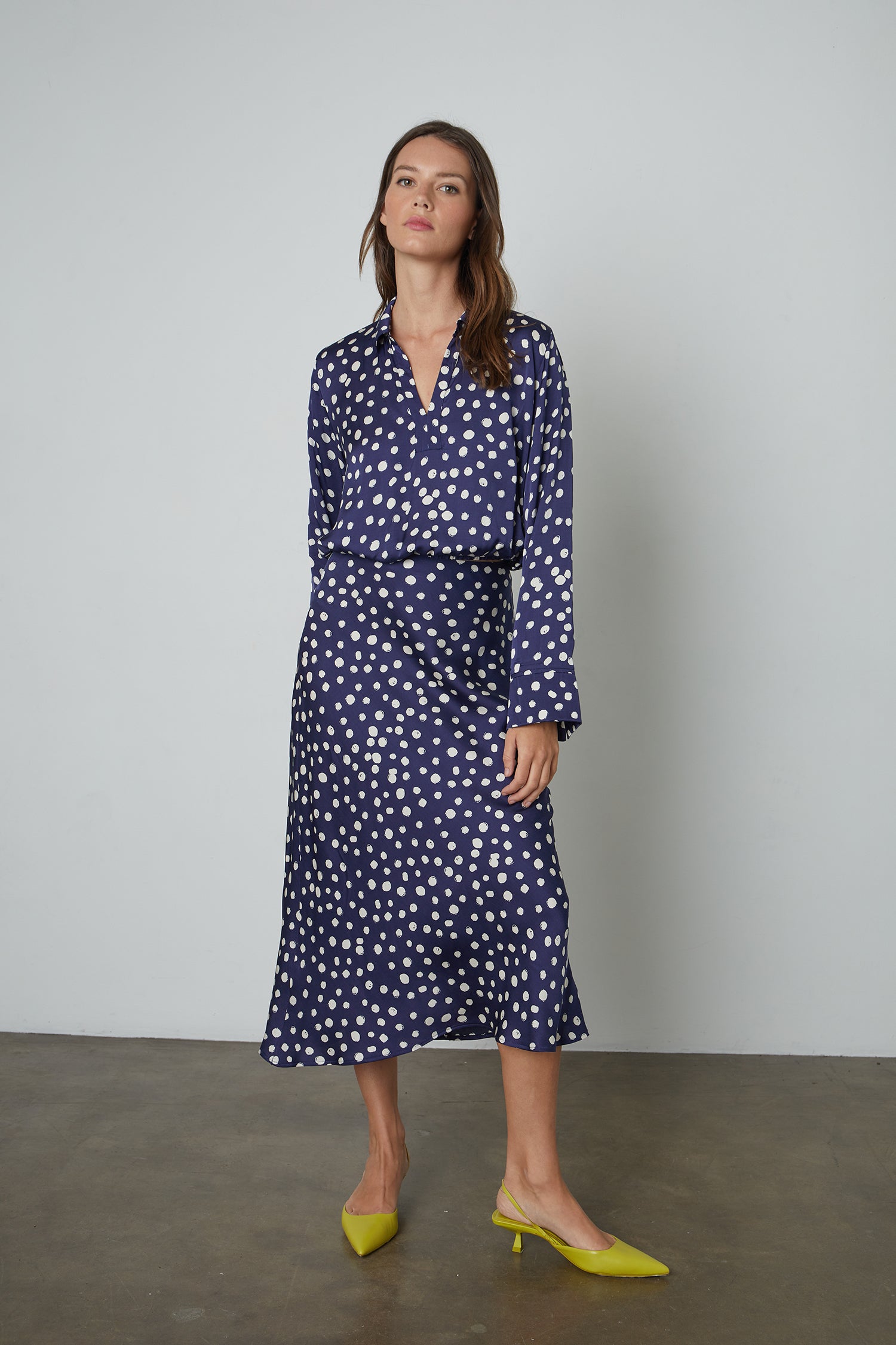 Navy blue skirt with white store polka dots