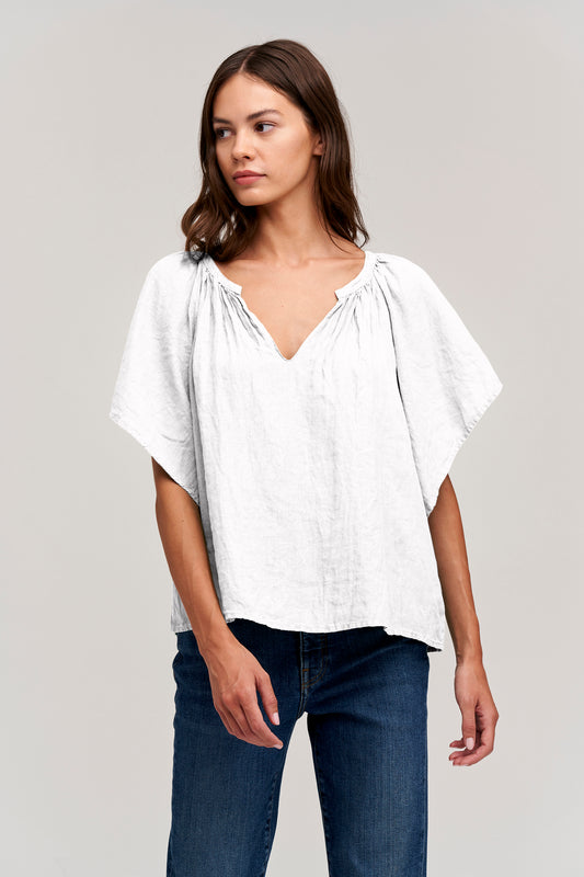 KALILA WOVEN LINEN RUFFLE SLEEVE TOP IN WHITE