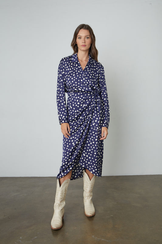 ZENDAYA POLKA DOT WRAP DRESS IN NAVY