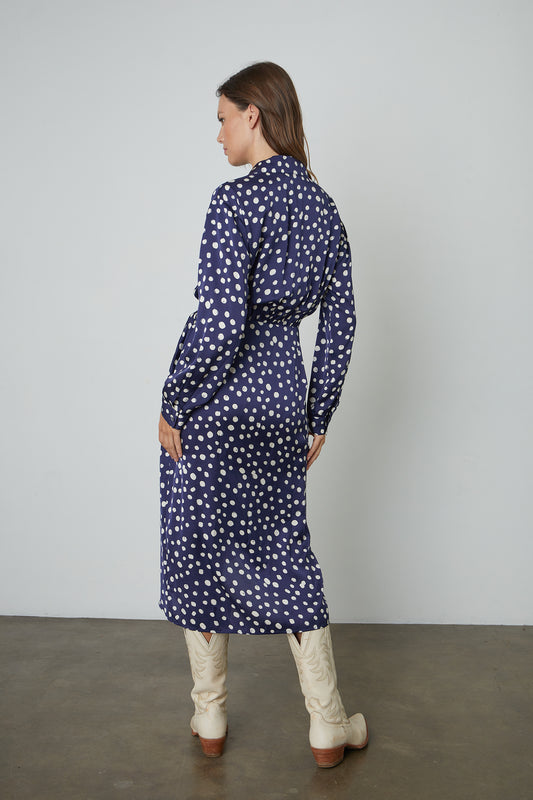 ZENDAYA POLKA DOT WRAP DRESS IN NAVY